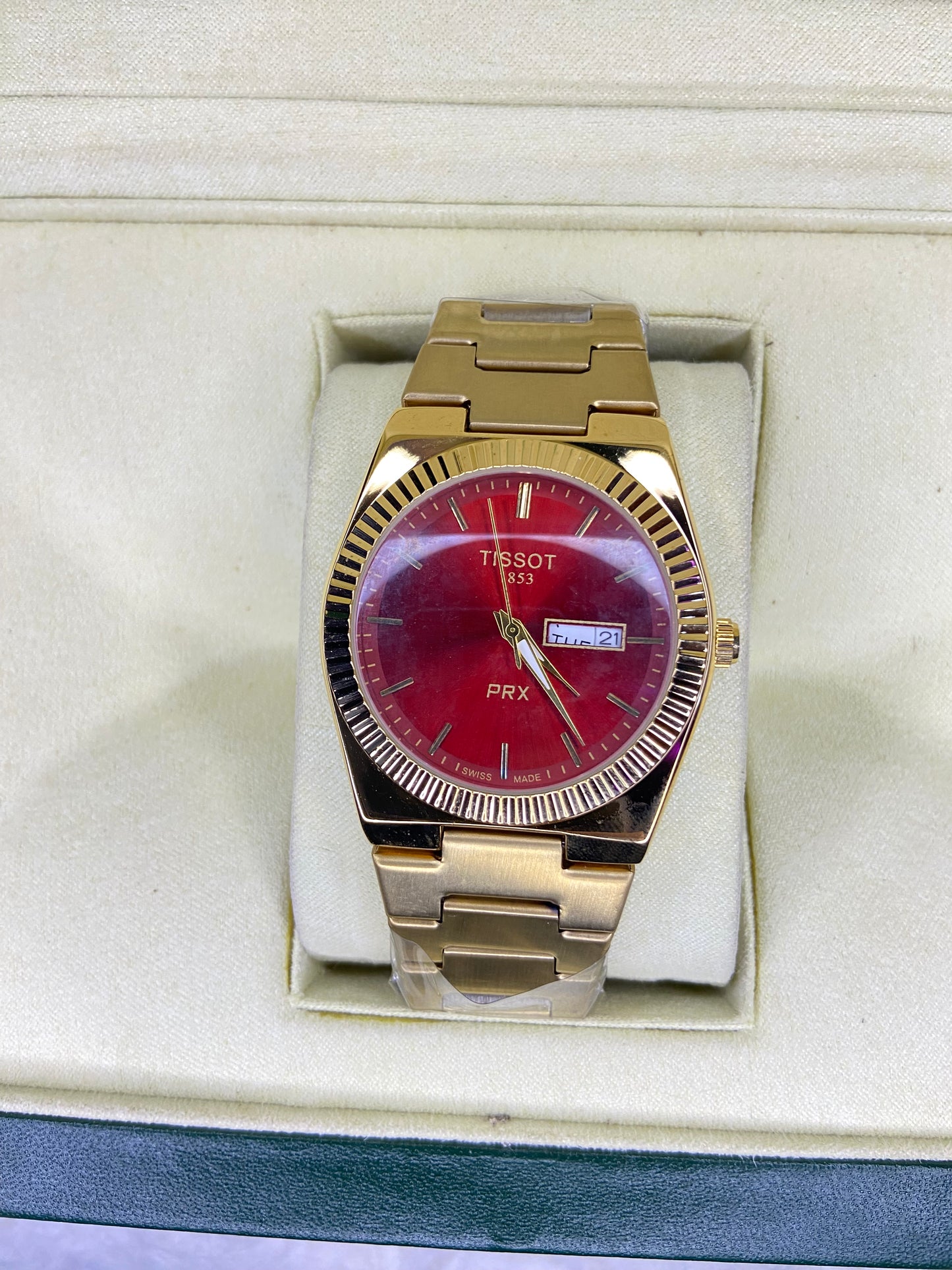 Tissot Prx 1853 gold With red Dail