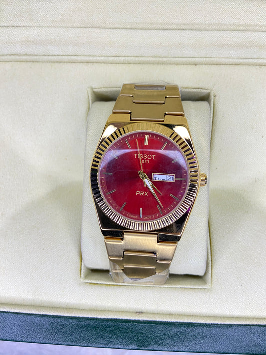 Tissot Prx 1853 gold With red Dail