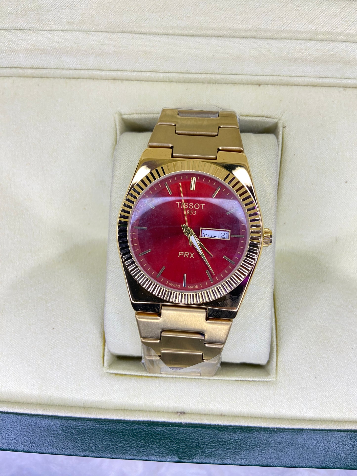Tissot Prx 1853 gold With red Dail